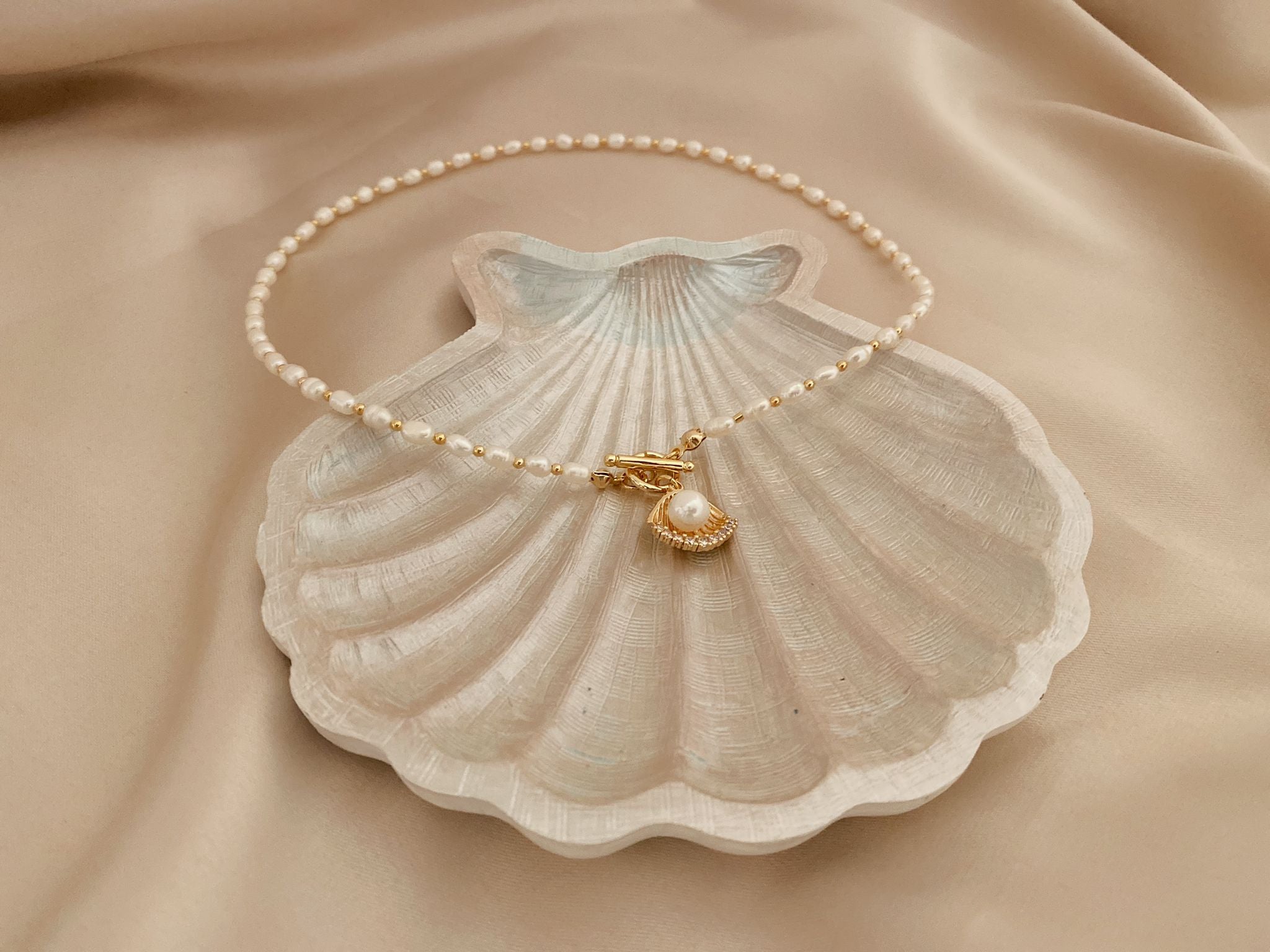 Pearl Necklace with Clam Charm