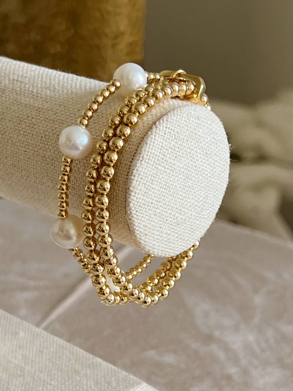 Bracelet of 3 with gold balls and pearls