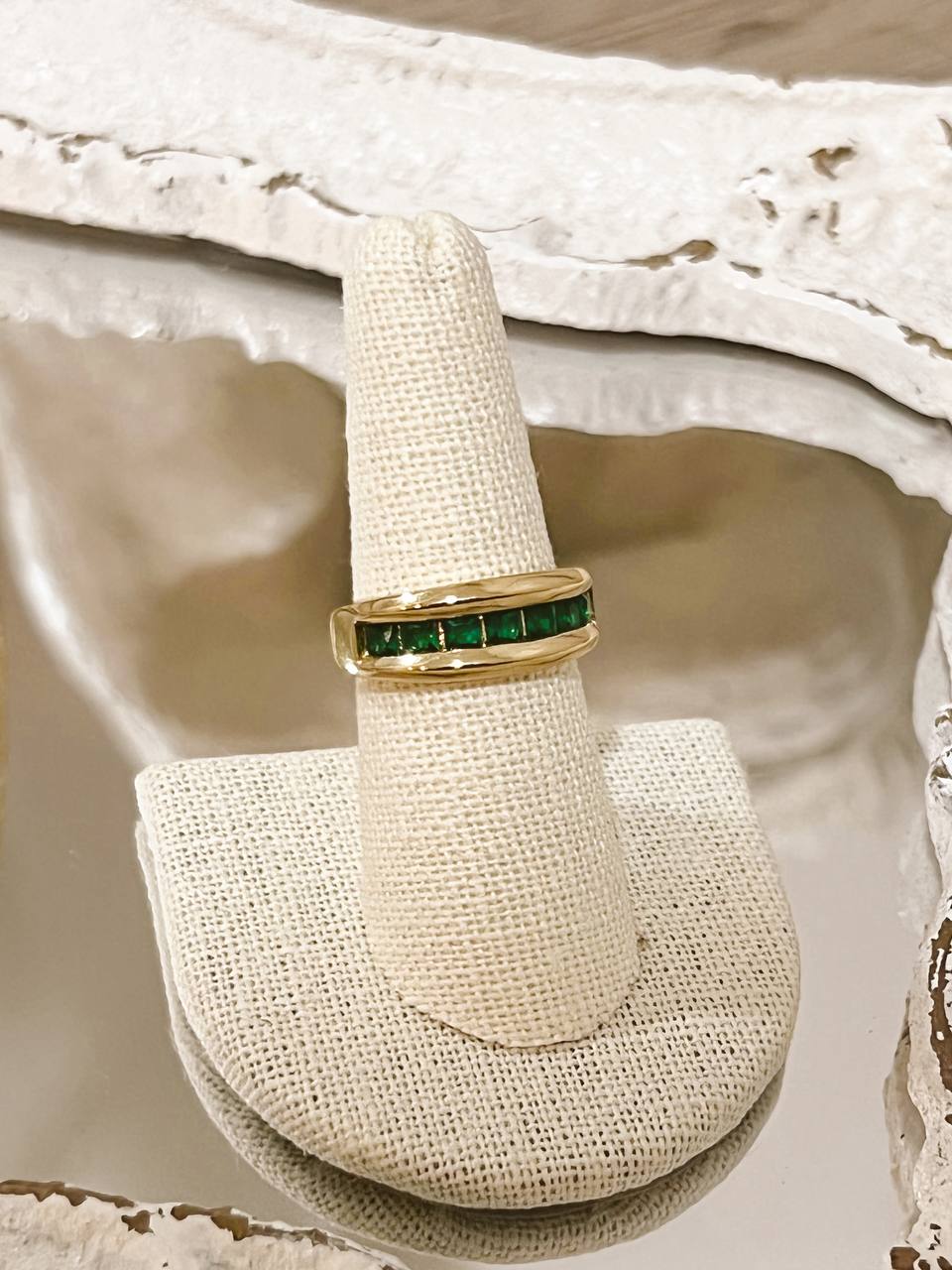 Ring with green stones
